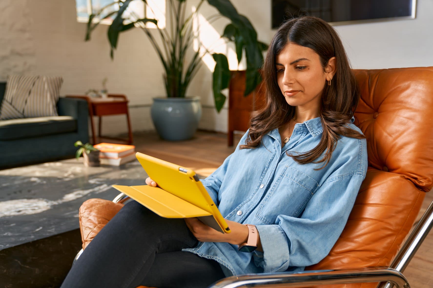A woman sitting on the couch